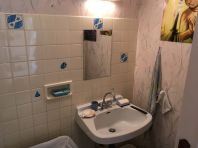 Une salle de bain classique de longue date !